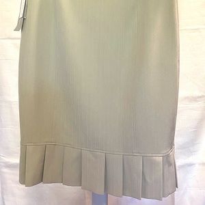 Tan skirt with hemline pleats